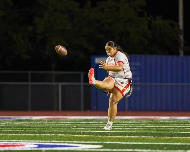 Corona’s Anasita Luga (3) punts away the ball on 4th down.