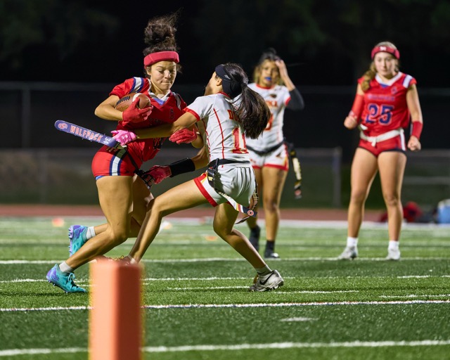 Great Oak’s wide receiver, Alina Santibanez (34) snags the ball on a short pass and battles forward before her flag is pulled short of the endzone.