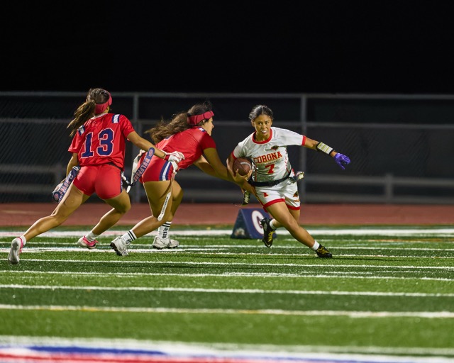 Corona’s  Tehya Santos #7 catches a short pass, turns inside, and attempts to get around the Great Oak defenders.