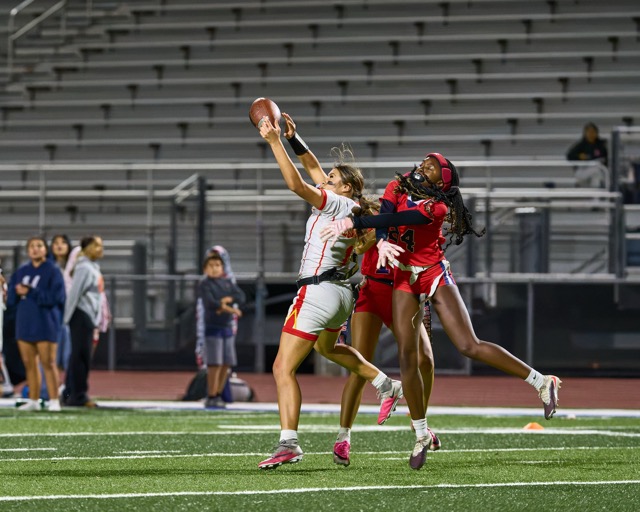 Corona’s Jaslene Negrette (1) comes up with a big catch in traffic to keep the offense marching down the field. The Great Oak Wolfpack defeated the Corona Panthers 13-6 on Tuesday October 13.