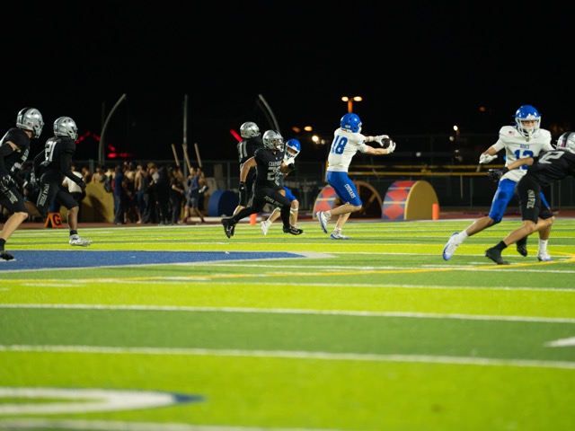 Norco’s Tegan Ogas (18), makes the grab in the middle of the field.