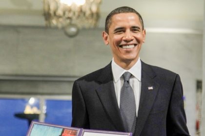 October 9. In this Dec. 10, 2009, file photo, President and Nobel Peace Prize laureate Barack Obama poses with his medal and diploma at the Nobel Peace Prize ceremony at City Hall in Oslo. Seven years ago Obama won the Nobel Peace Prize. On matters of war and peace, Obama has proven to be a confounding and contradictory figure, one who stands to leave behind both devastating and pressing failures, as well as a set of fresh accomplishments whose impact could resonate for decades.  Credit: AP Photo/John McConnico