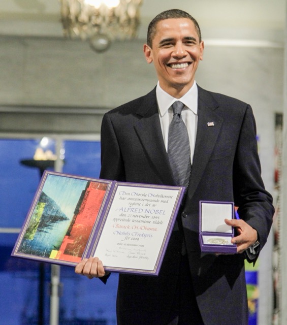 October 9. In this Dec. 10, 2009, file photo, President and Nobel Peace Prize laureate Barack Obama poses with his medal and diploma at the Nobel Peace Prize ceremony at City Hall in Oslo. Seven years ago Obama won the Nobel Peace Prize. On matters of war and peace, Obama has proven to be a confounding and contradictory figure, one who stands to leave behind both devastating and pressing failures, as well as a set of fresh accomplishments whose impact could resonate for decades. Credit: AP Photo/John McConnico