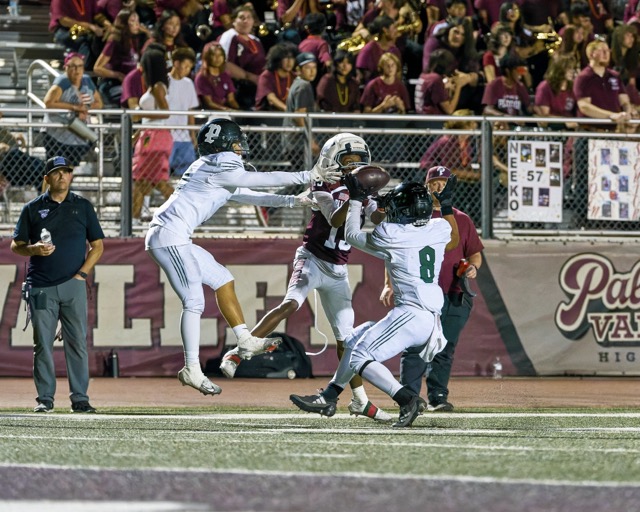 Paloma Valley’s Eunice Defro (#13) battles against double coverage but can’t come up with the reception 