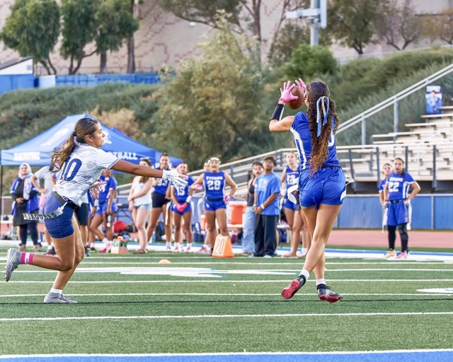 Temescal Canyon’s Leila Ortiz (#18) comes up with a reception that she take to the endzone to push Temescal Canyon further ahead.